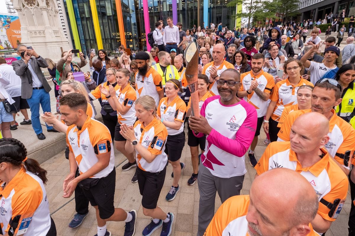 Sir Lenny Henry takes part in The Queen's Baton Relay as it visits Birmingham as part of the Birmingham 2022 Queen’s Baton Relay on July 27 in Birmingham. 