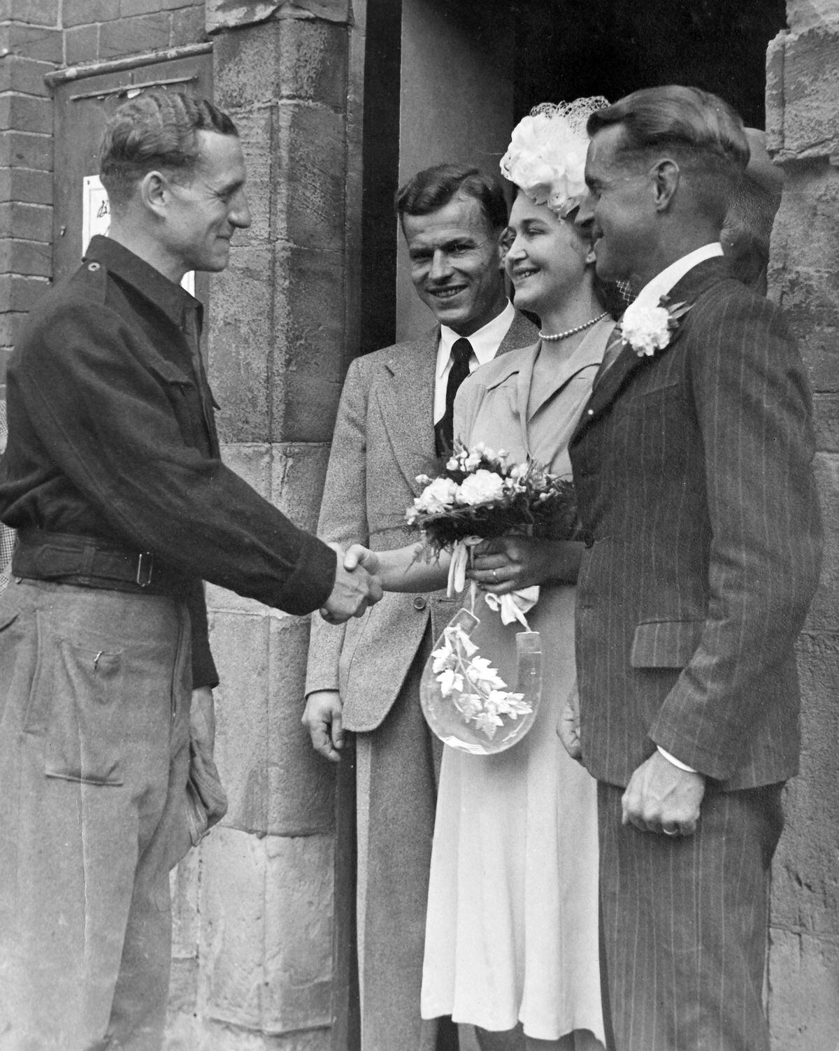 Wilken Ranck and bride Elsa Andersen being congratulated in August 1947