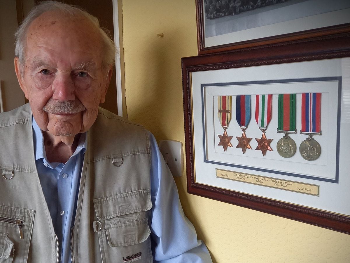 Cedric Parcell with his war medals 