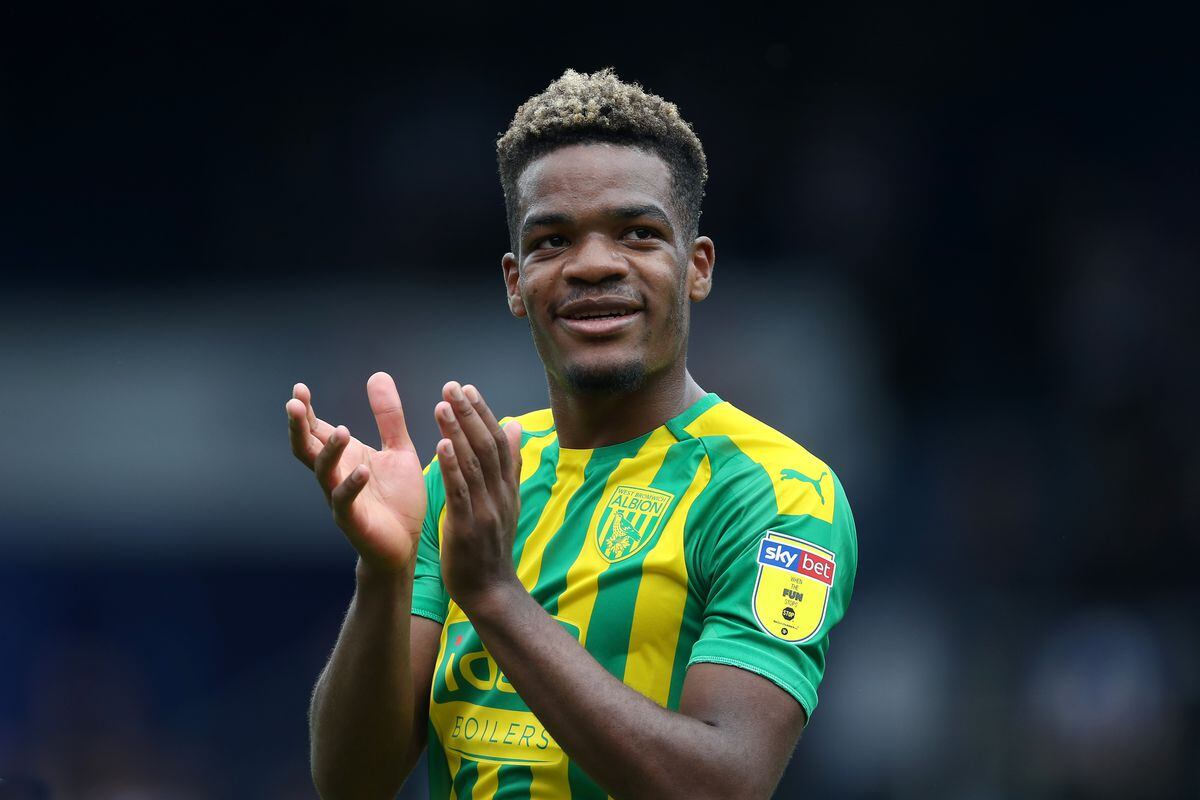 Grady Diangana of West Bromwich Albion celebrates with the West Bromwich Albion Fans at the end of the match.