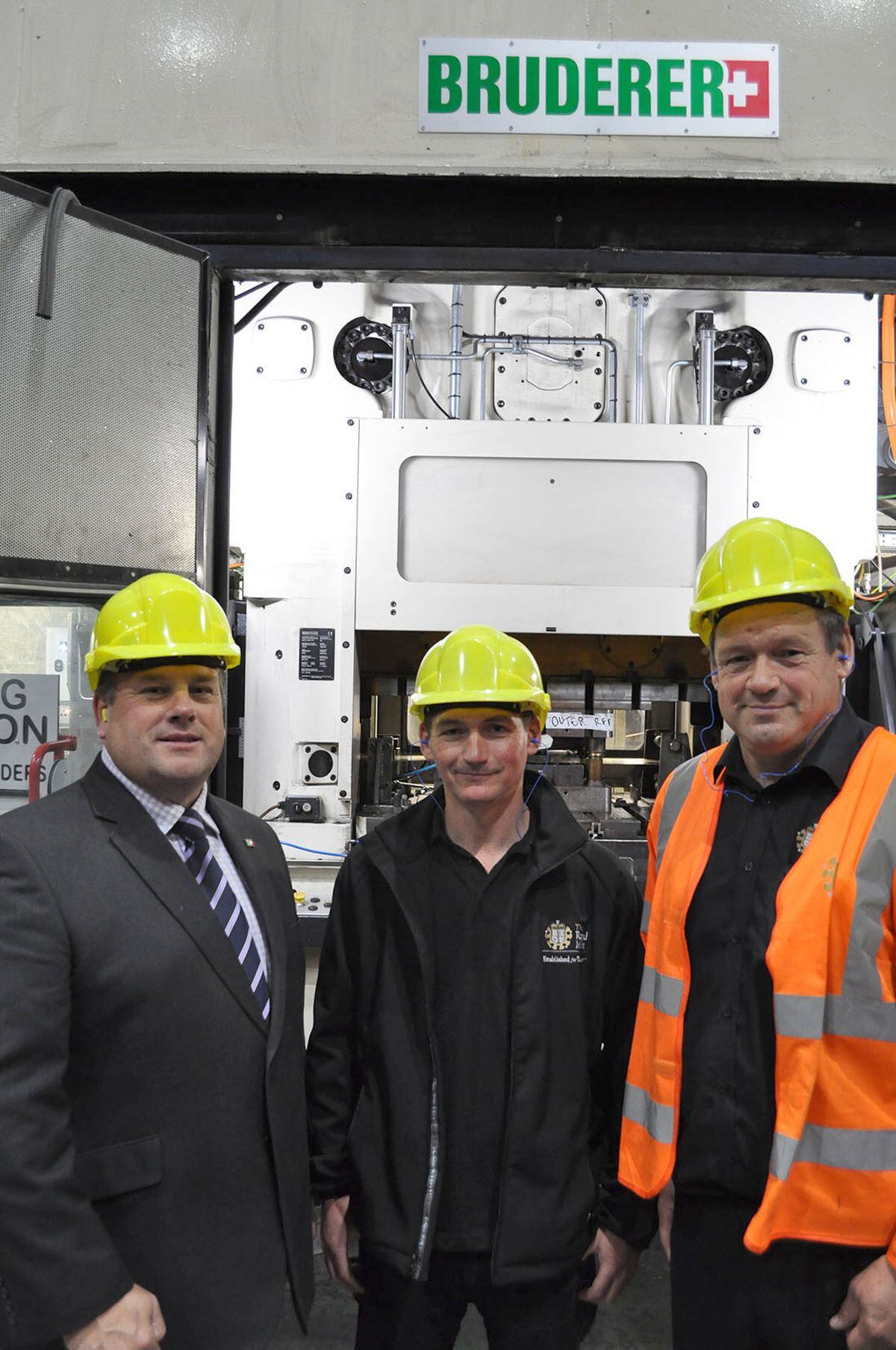 From left: Adrian Haller of Bruderer UK with Mervyn Evans and David McCarthy from the Royal Mint