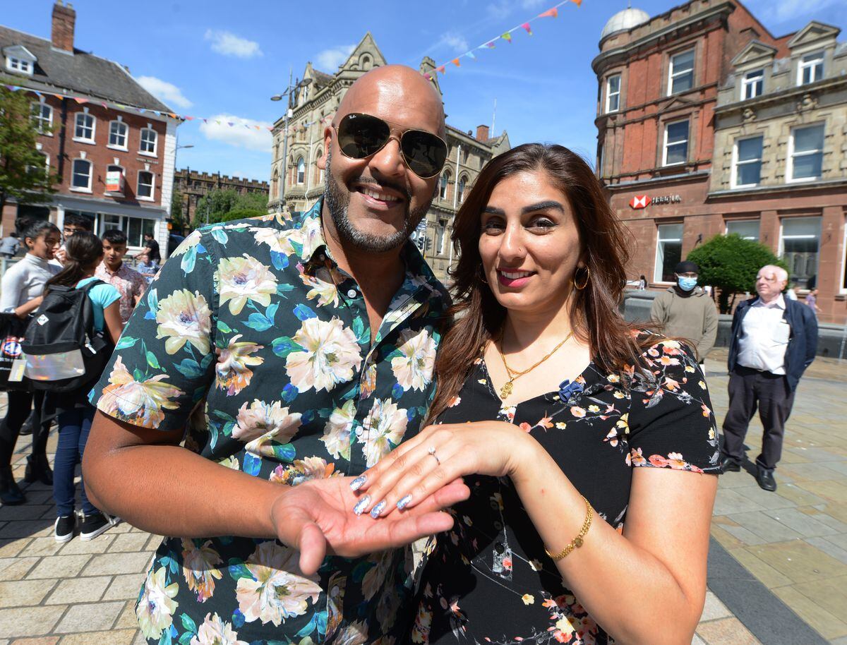The newly engaged Parvinder Singh Rakhra and Sharon Kaur in Queen Square.