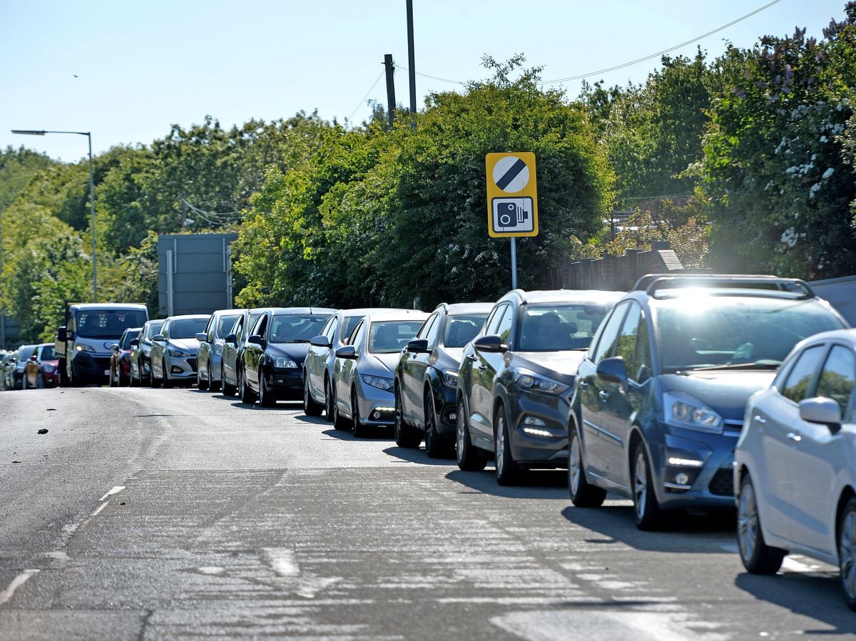 Cars queue along the A5190, as Cannock tip, in Lichfield Road, reopened to residents on Thursday