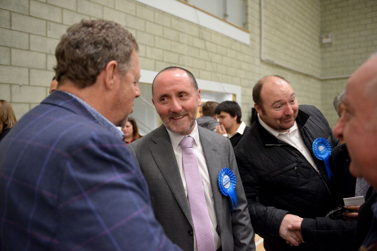 Eddie Hughes celebrates after holding onto Walsall North for the Conservatives