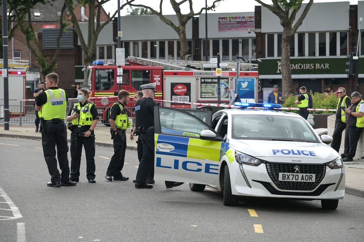 Police at the scene in Bradford Place. Photo: SnapperSK