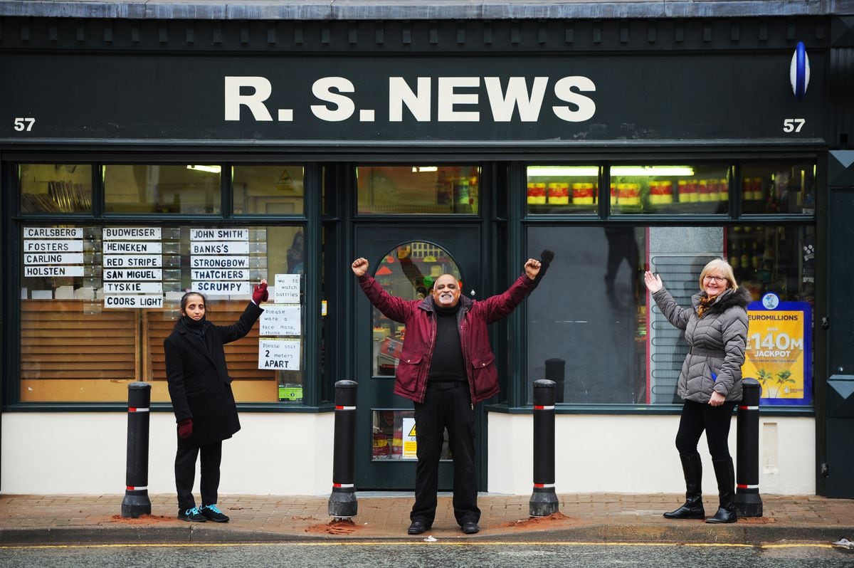 Open again following a ram raid in October, Rajendra Patel, centre, with wife Yamin, left, and Councillor Diane Coughlan