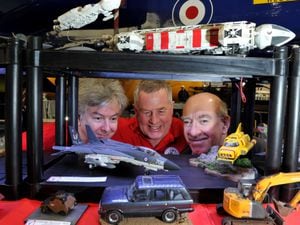 With a collection of different vehicles is Andrew Prentis, Rod Ulrich and Eric McLoughlin