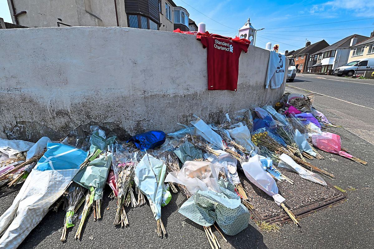 Tributes in Mount Lane, where Ronan Kanda was killed