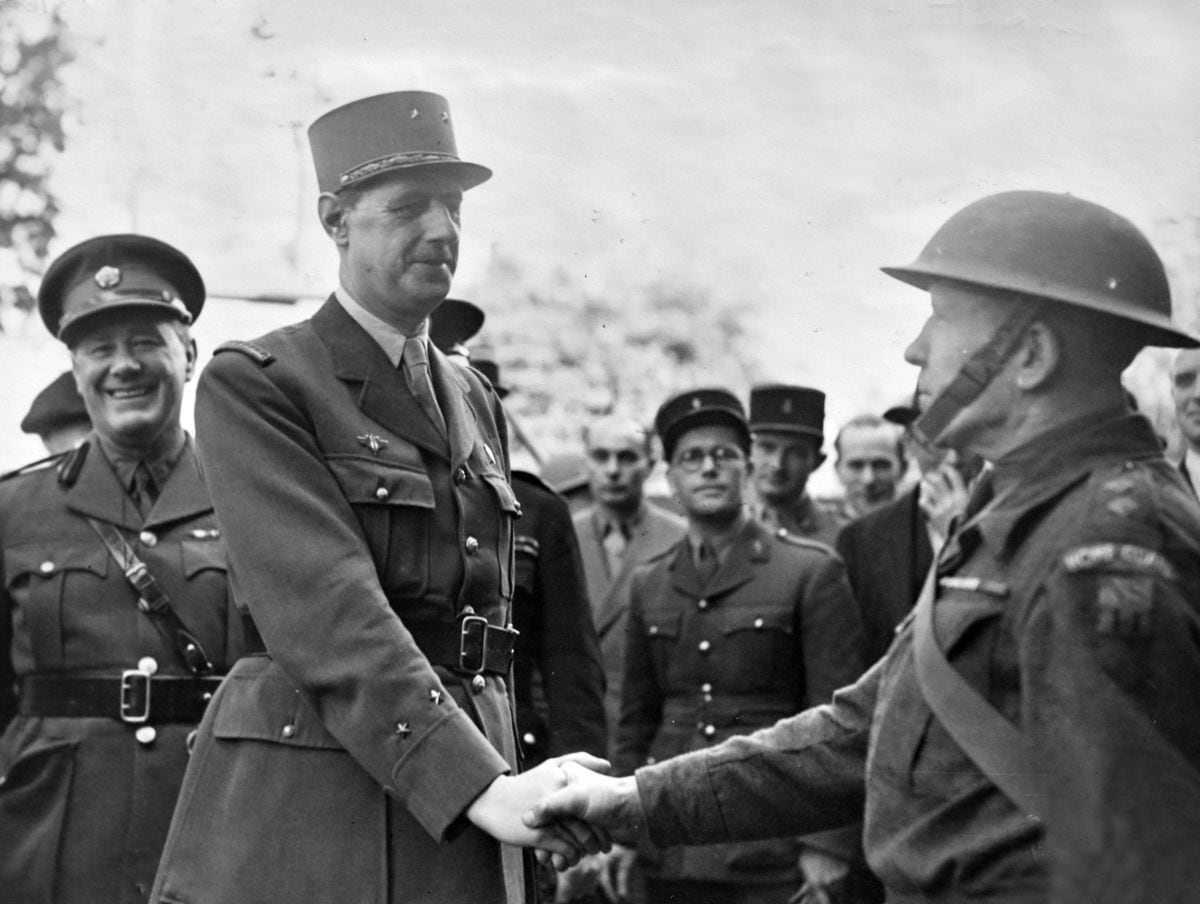 A handshake for Lieutenant Quartermaster J Sabin, who had won the Croix de Guerre on the Somme in 1917.