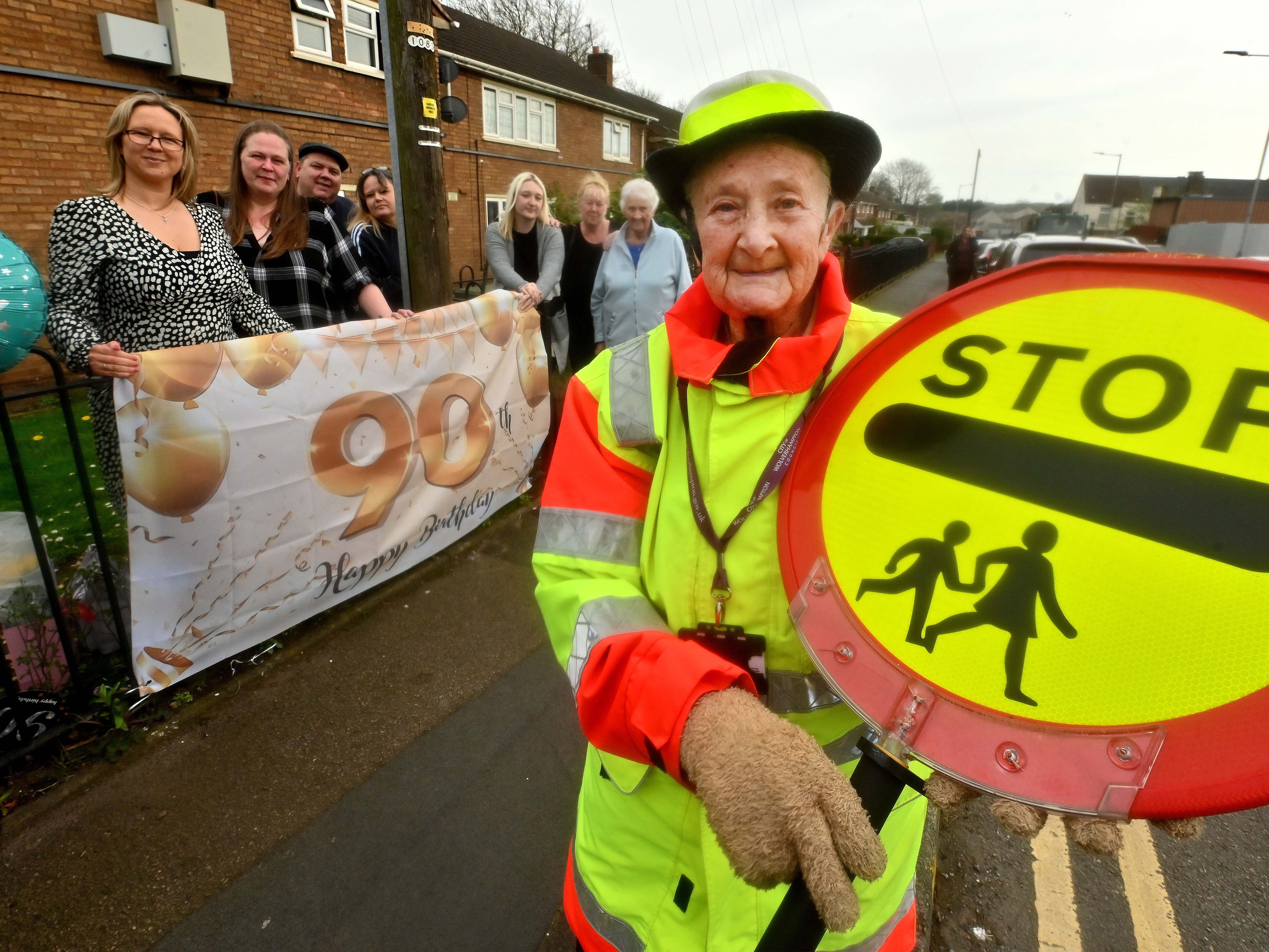 'I'm a 90-year-old lollipop lady - still helping kids twice a week after 51 years'