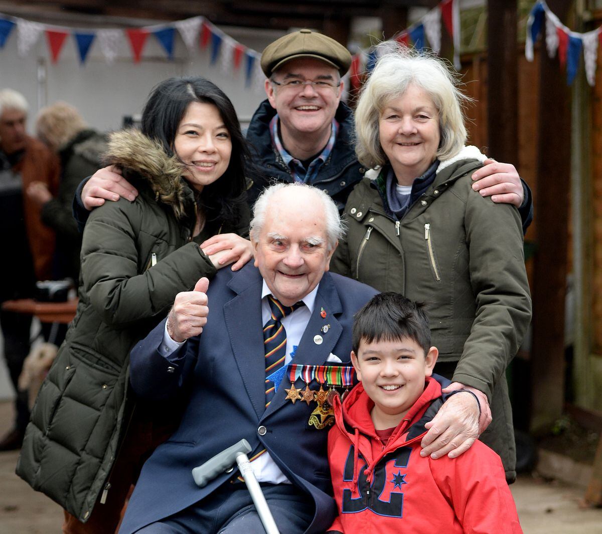 George with his family at his 100th birthday party earlier this year