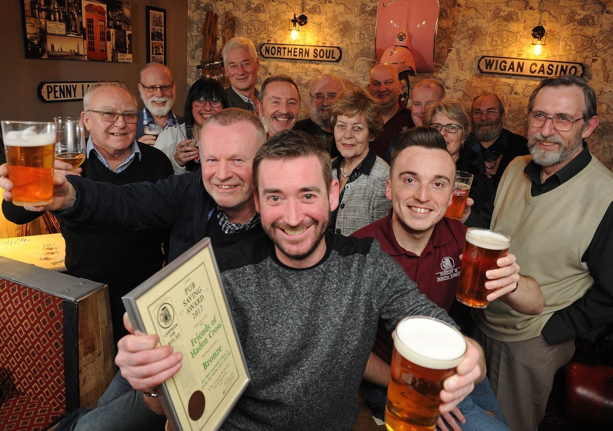 Celebrating a bronze award from CAMRA, (centre) manager Matt Carey, of Cradley Heath, with Friends of Haden Cross, including (front left) chairman Tim Haskey, of Cradley Heath, and members of Dudley & South Staffordshire CAMRA, including (front right) chairman Ryan Hunt, of Dudley, at The Haden Cross, Halesowen Road, Cradley Heath