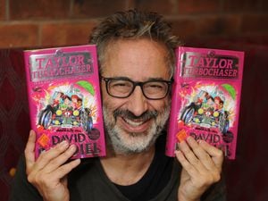 David Baddiel at Wolverhampton Grand Theatre, with copies of his book The Taylor Turbocharger