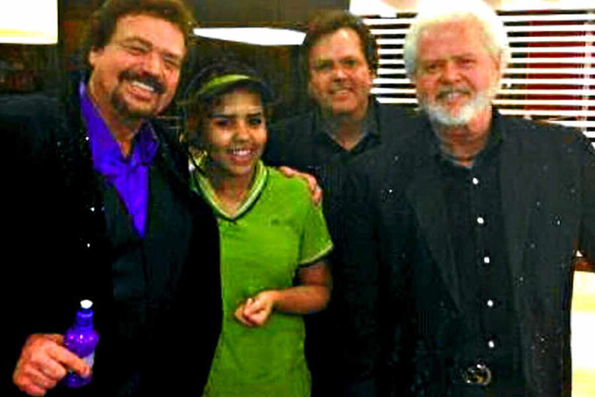 Hungry Osmonds dish up a treat for amazed Coseley McDonald's workers