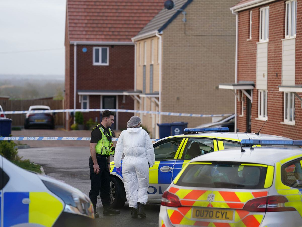 Police and forensics at the scene in Meridian Close, Bluntisham, Cambridgeshire, where police found the body of a 32-year-old man with a gunshot wound