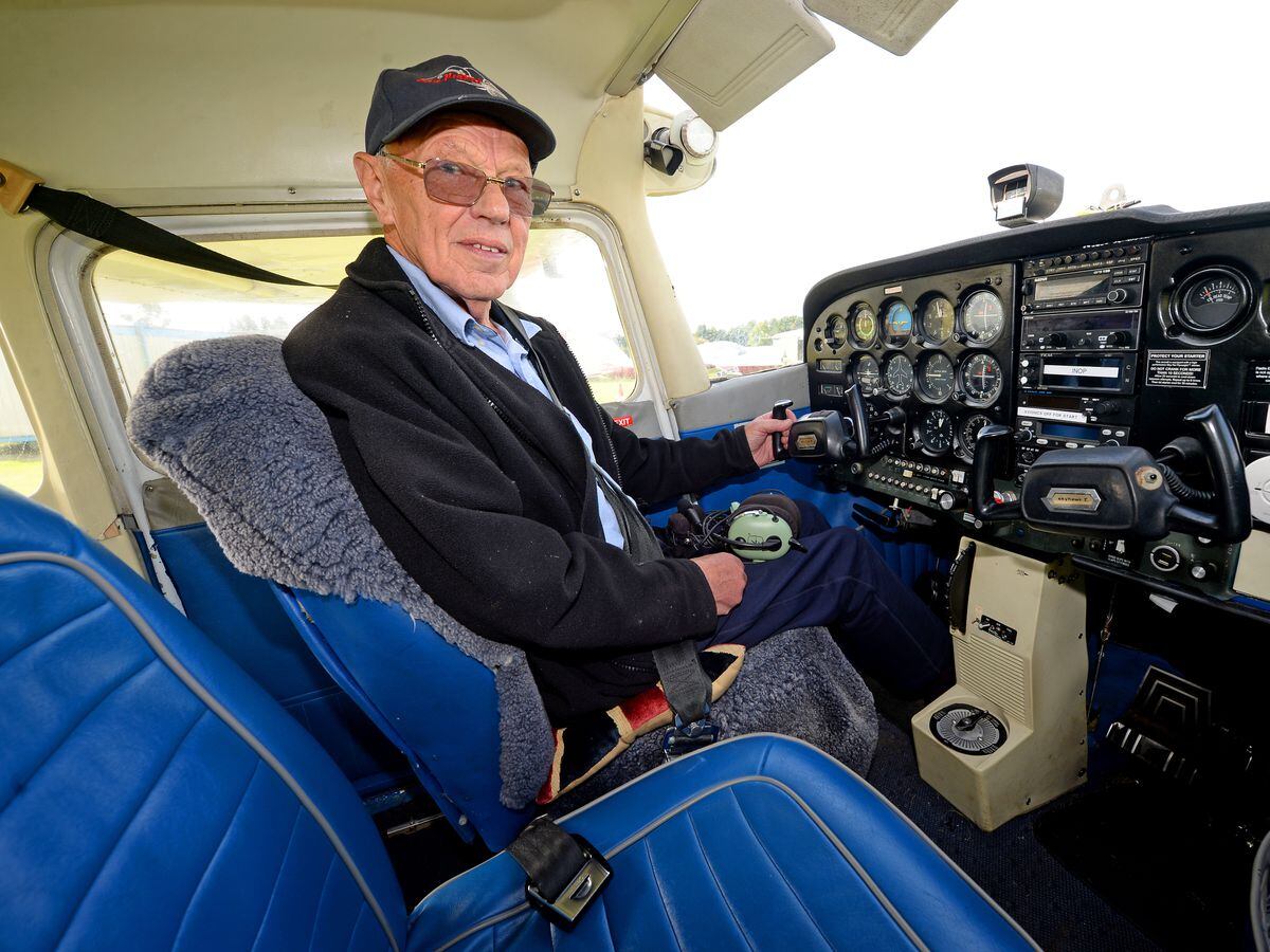 LAST COPYRIGHT EXPRESS&STAR TIM THURSFIELD-18/09/20.Retired aircraft engineer and racing driver Alan Cottam from Claverley enjoys a morning at Halpenny Green Airport, organised by his son Edward, to mark his 86th birthday.Alan ready for his surprise flight..