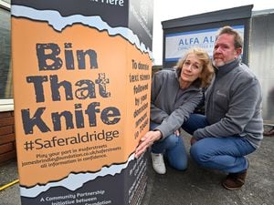 Beverley and Mark Brindley next to a new knife bin in Aldridge High Street. They are the parents of James Brindley, who was killed in a knife attack in 2017.