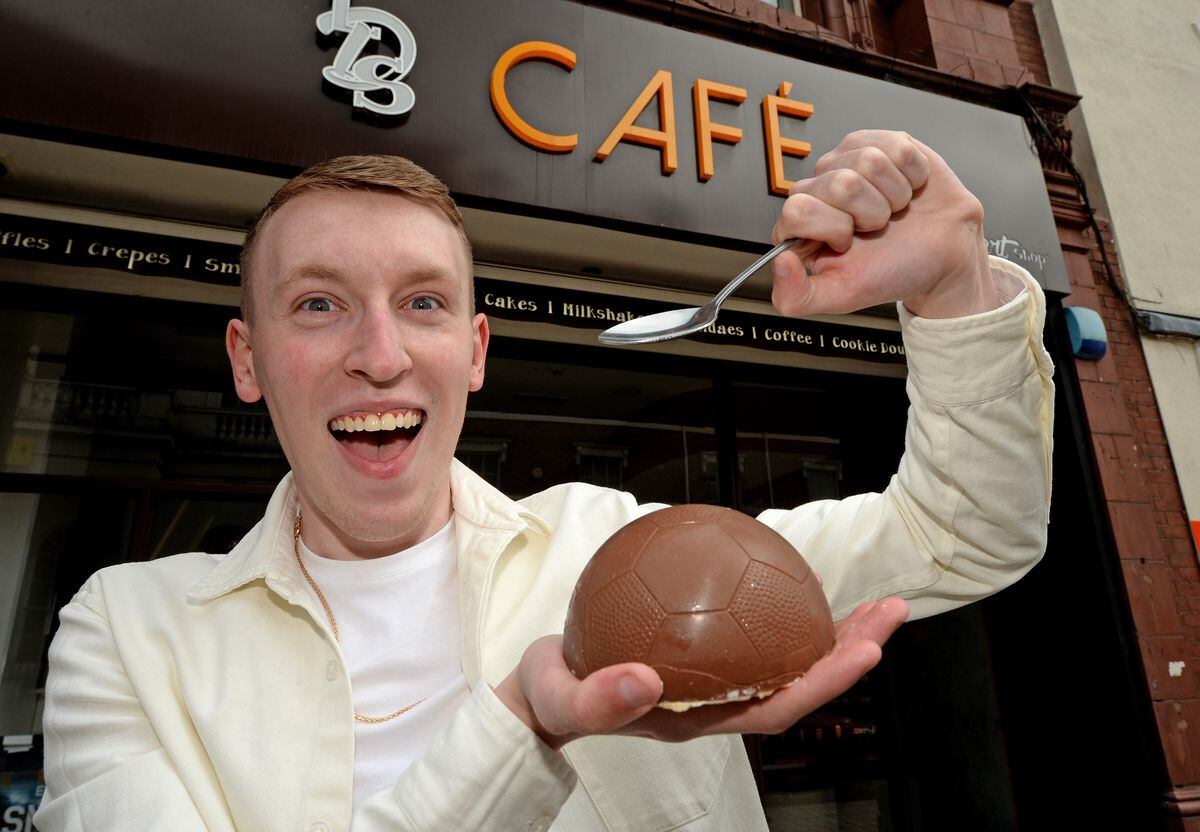 Josh Allen with one of the chocolate smash footballs, which the shop is now selling to commemorate the Euros