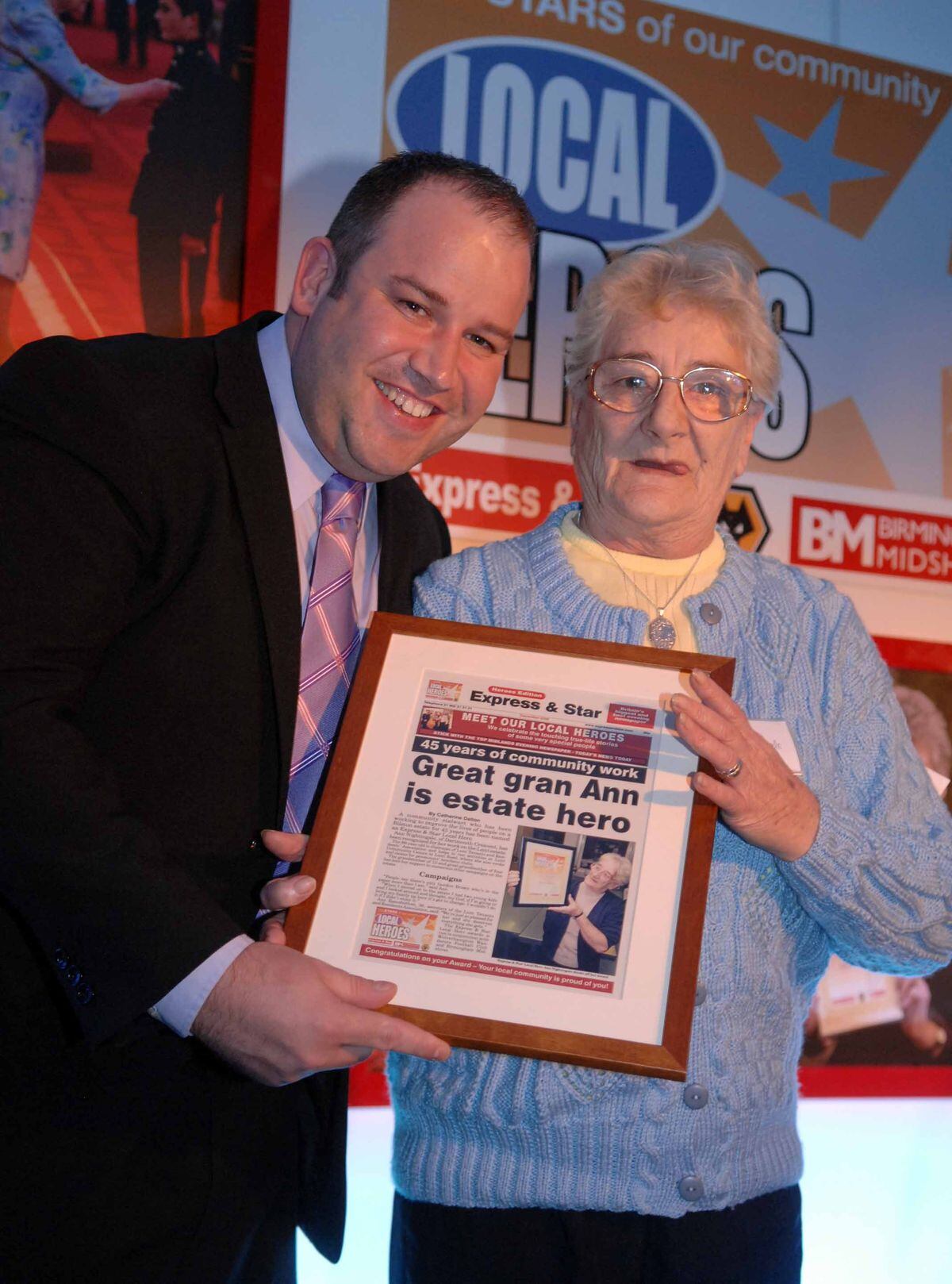 Dicky Dodd presents an award to Ann Nightingale during the Express & Star's Local Hero Awards at The Molineux, Wolverhampton.