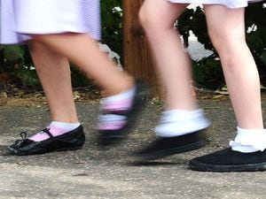 A generic stock photo of school girls walking to school (Ian West/PA)