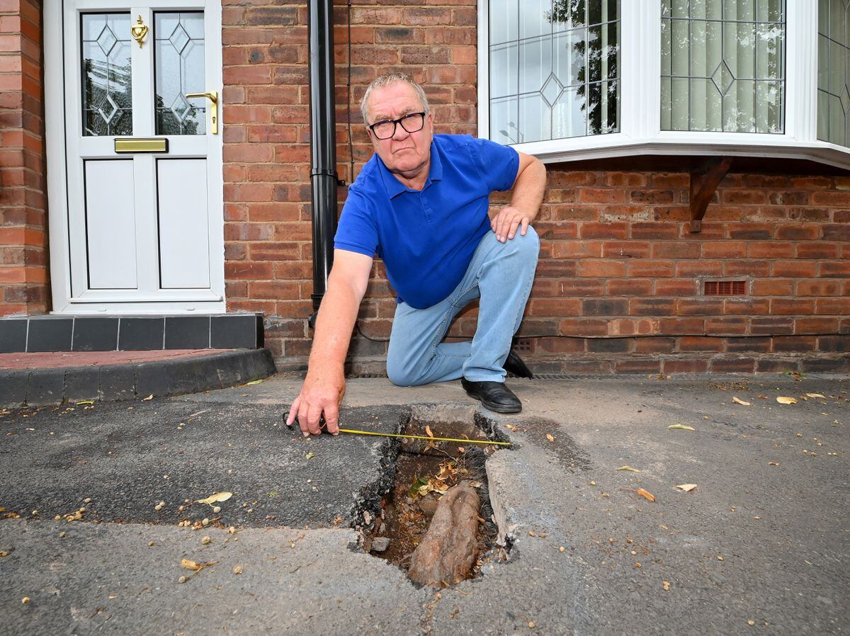 Councillor Paul Bott has a huge tree root causing problems to his property on Broad Lane, Bloxwich