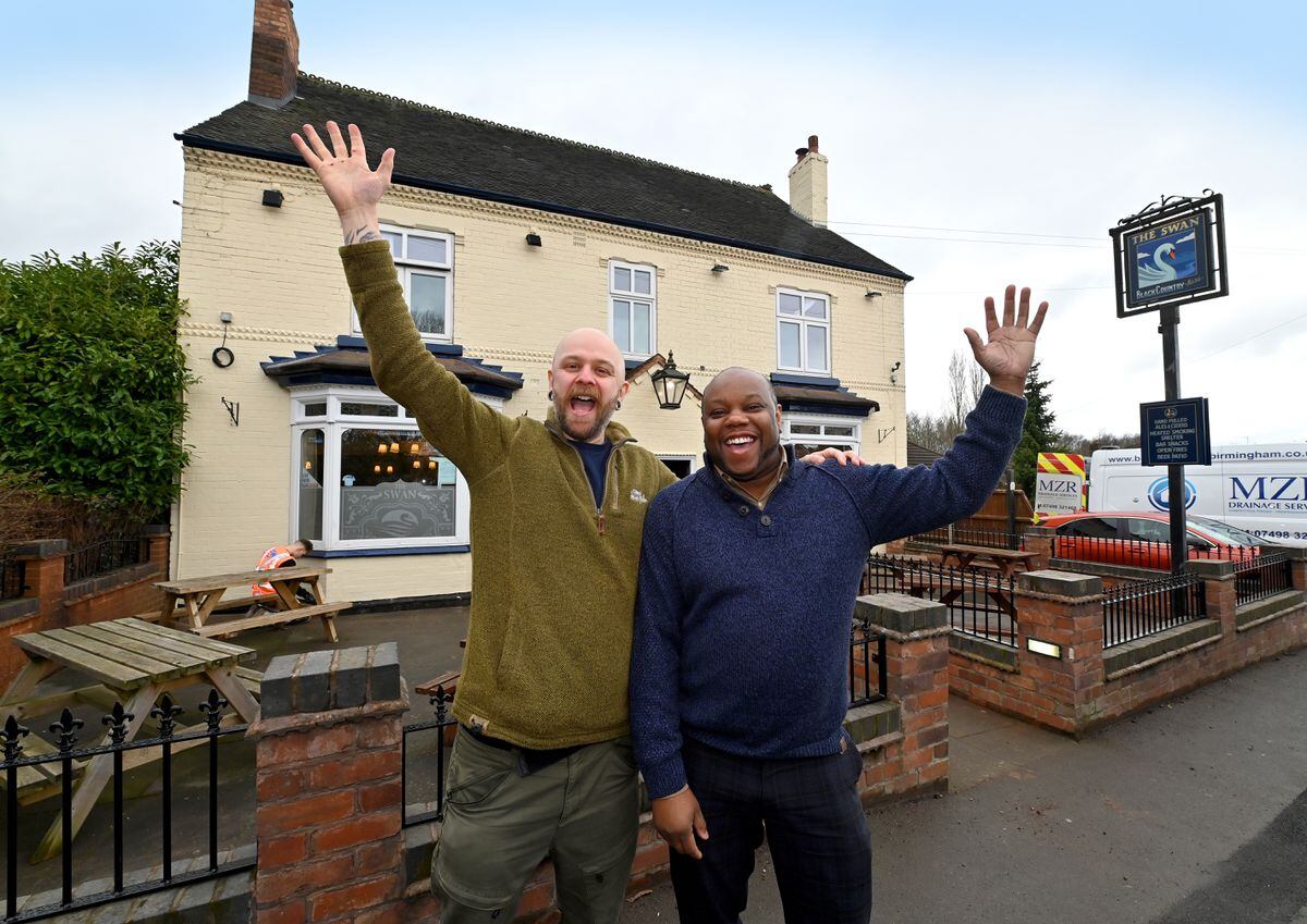 New licensee Oliver Kendall and area manager Daniel Richards celebrate that The Swan pub, Brownhills, will be opening later this month