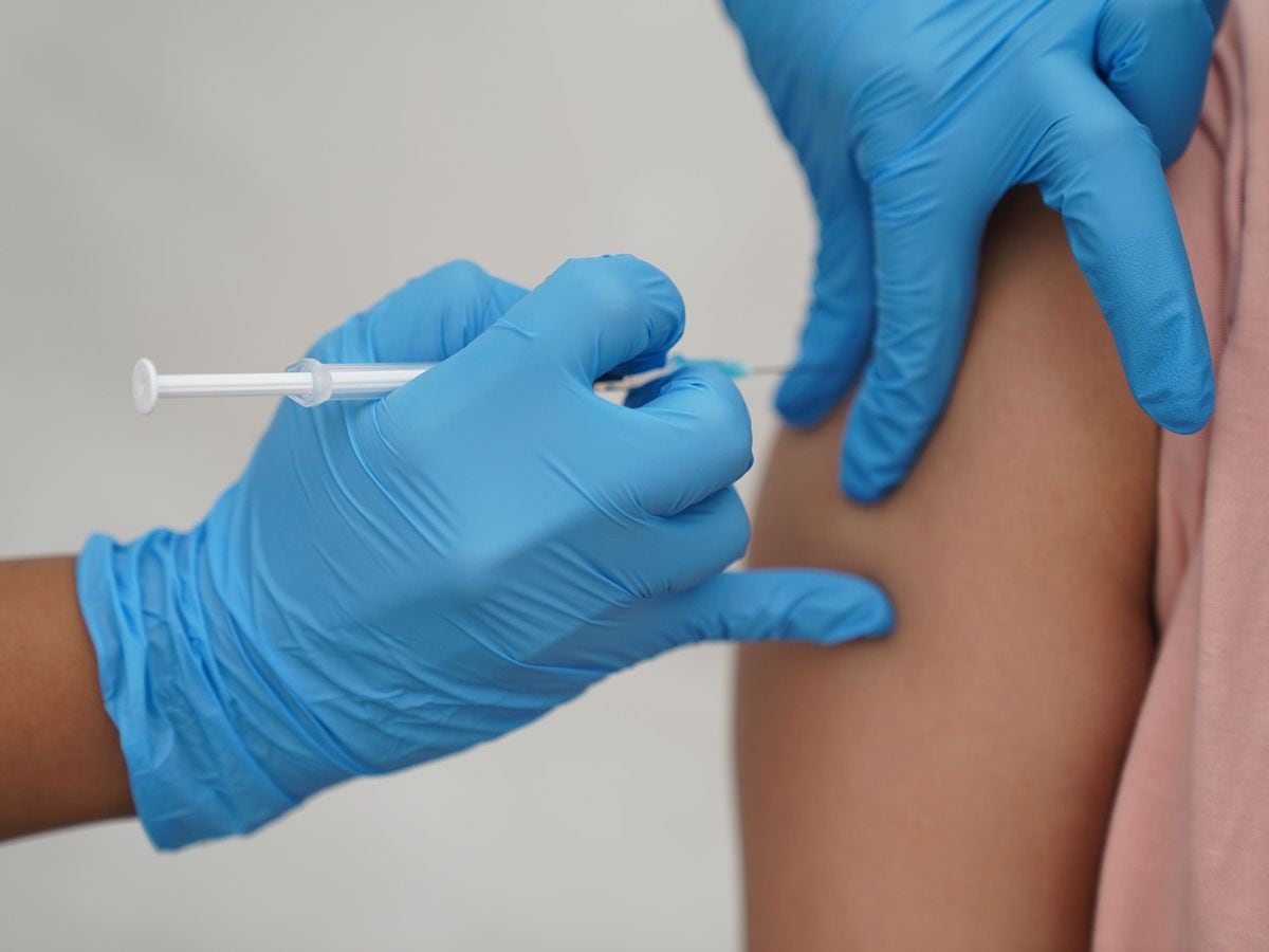 A person is given a Covid-19 vaccination