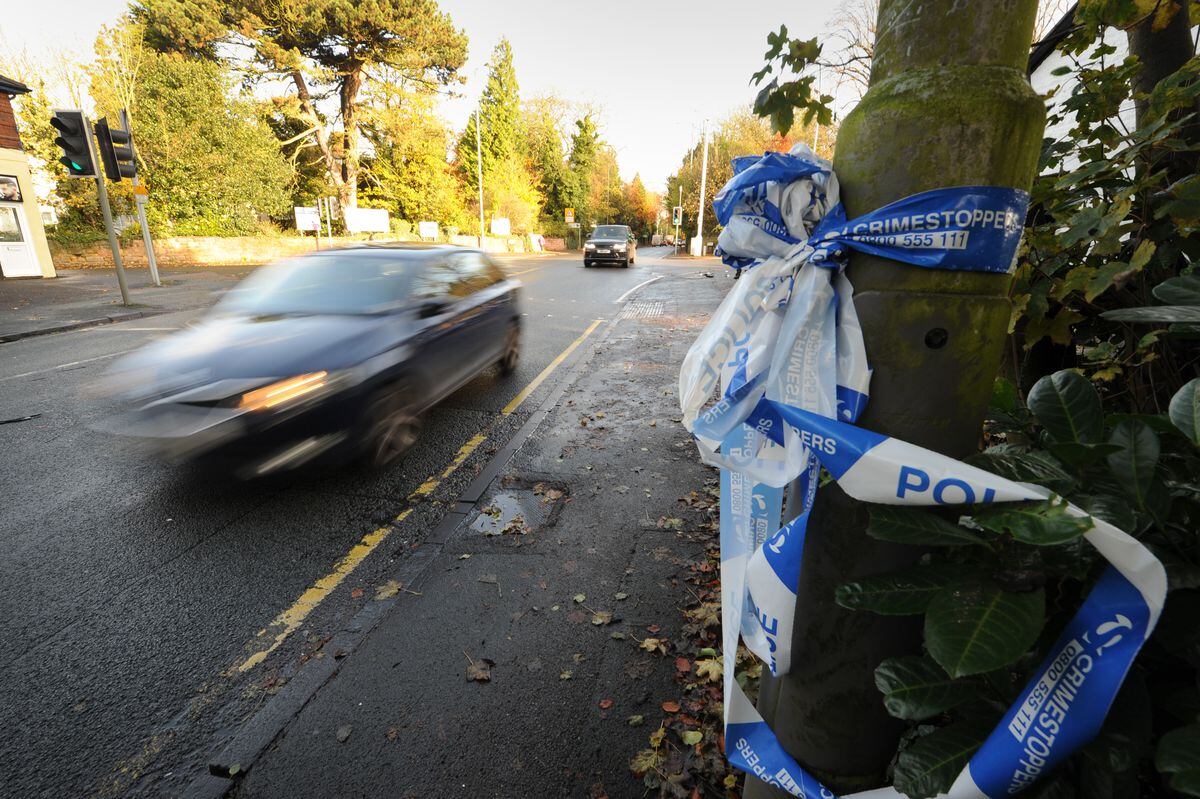 Police tape left shows where the road was closed on Sunday evening