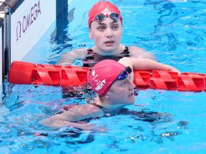 Great Britain’s Tully Kearney, top, had to settle for 200m freestyle silver, while team-mate Suzanna Hext was fourth