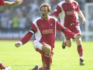 COPYRIGHT EXPRESS&STAR TIM THURSFIELD 09/08/03 WALSALL V ALBIONTher's only one Paul Merson! Paul Merson celebrates his goal today.