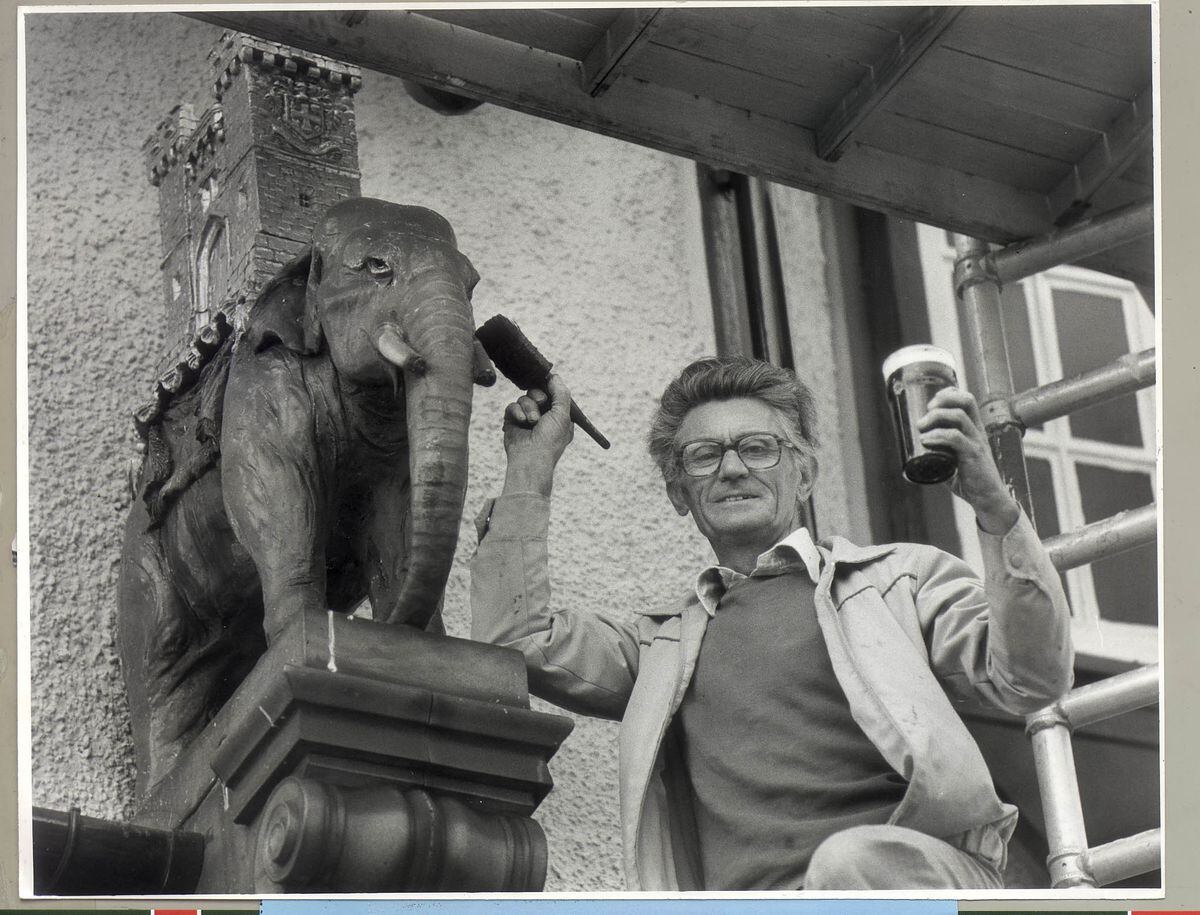 In September 1984 tiler Ken Lawton, of Wynchcombe Avenue, Penn, climbed the scaffold being used during repainting of the pub to raise a glass to the elephant