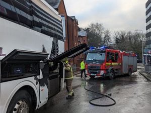 New Road in Halesowen is closed due to a coach fire
