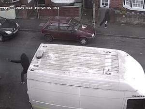 A screenshot of the CCTV of the shooting in Whitmore Reans