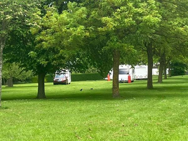 Travellers set up on Priory Park last month 