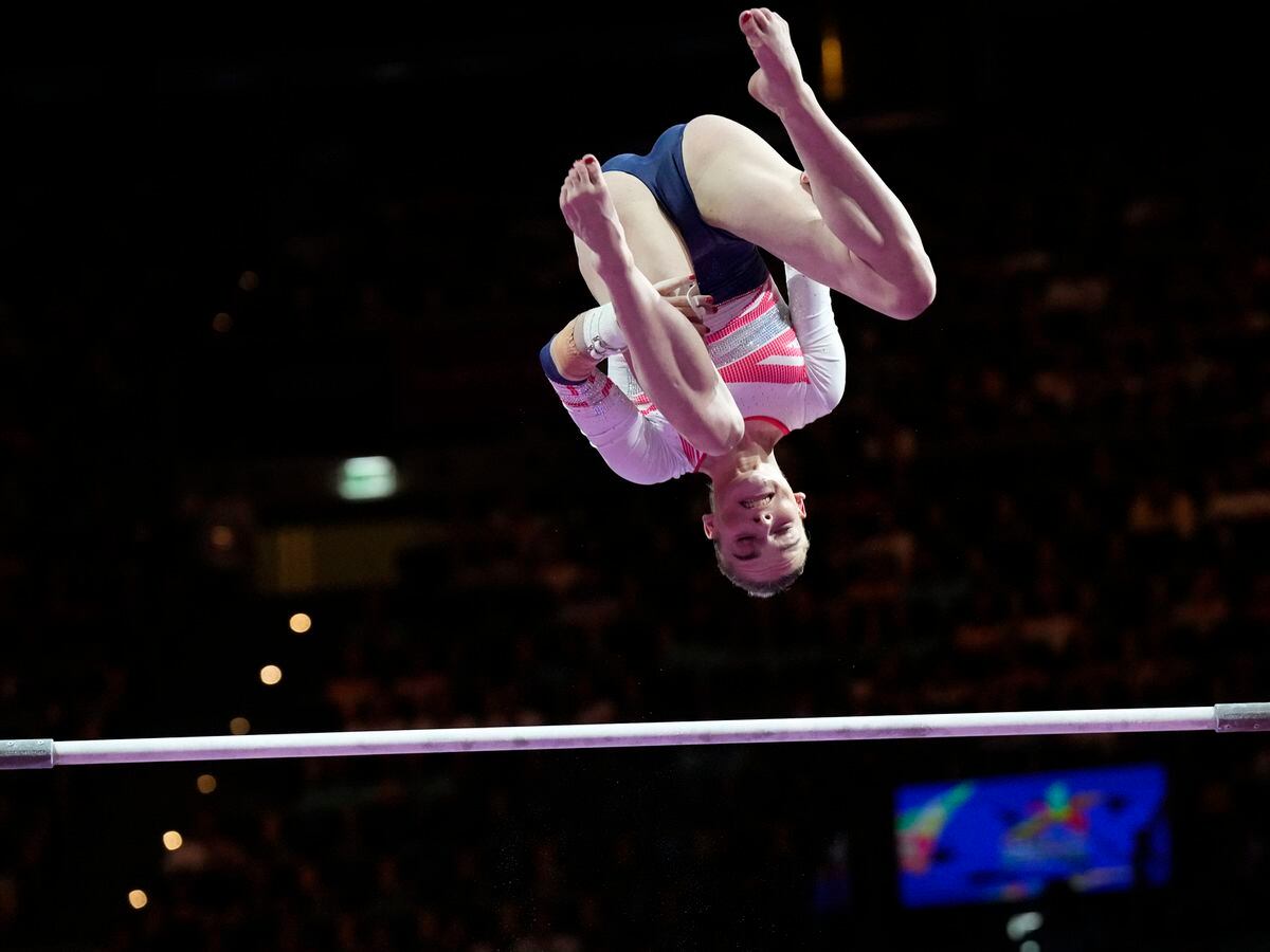 Britain's Alice Kinsella competes in the women's uneven bars final during the European Gymnastics Championships in Munich, Germany, Sunday, Aug. 14, 2022. (AP Photo/Martin Meissner).