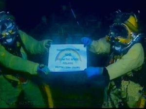 RMT divers with NHS sign