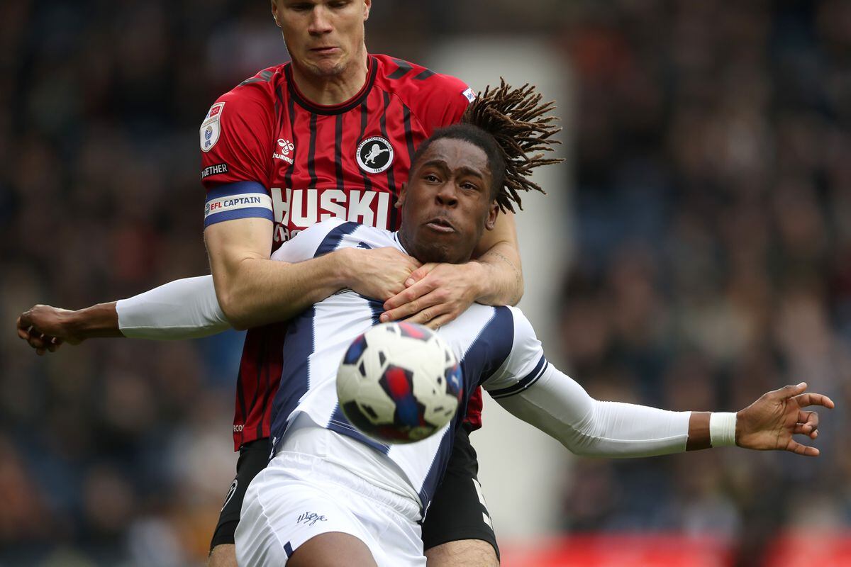 Brandon Thomas-Asante of West Bromwich Albion and Millwall's Jake Cooper (Photo by Adam Fradgley/West Bromwich Albion FC via Getty Images).