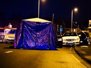 Police erected a blue tent at the crash site in Stafford Road