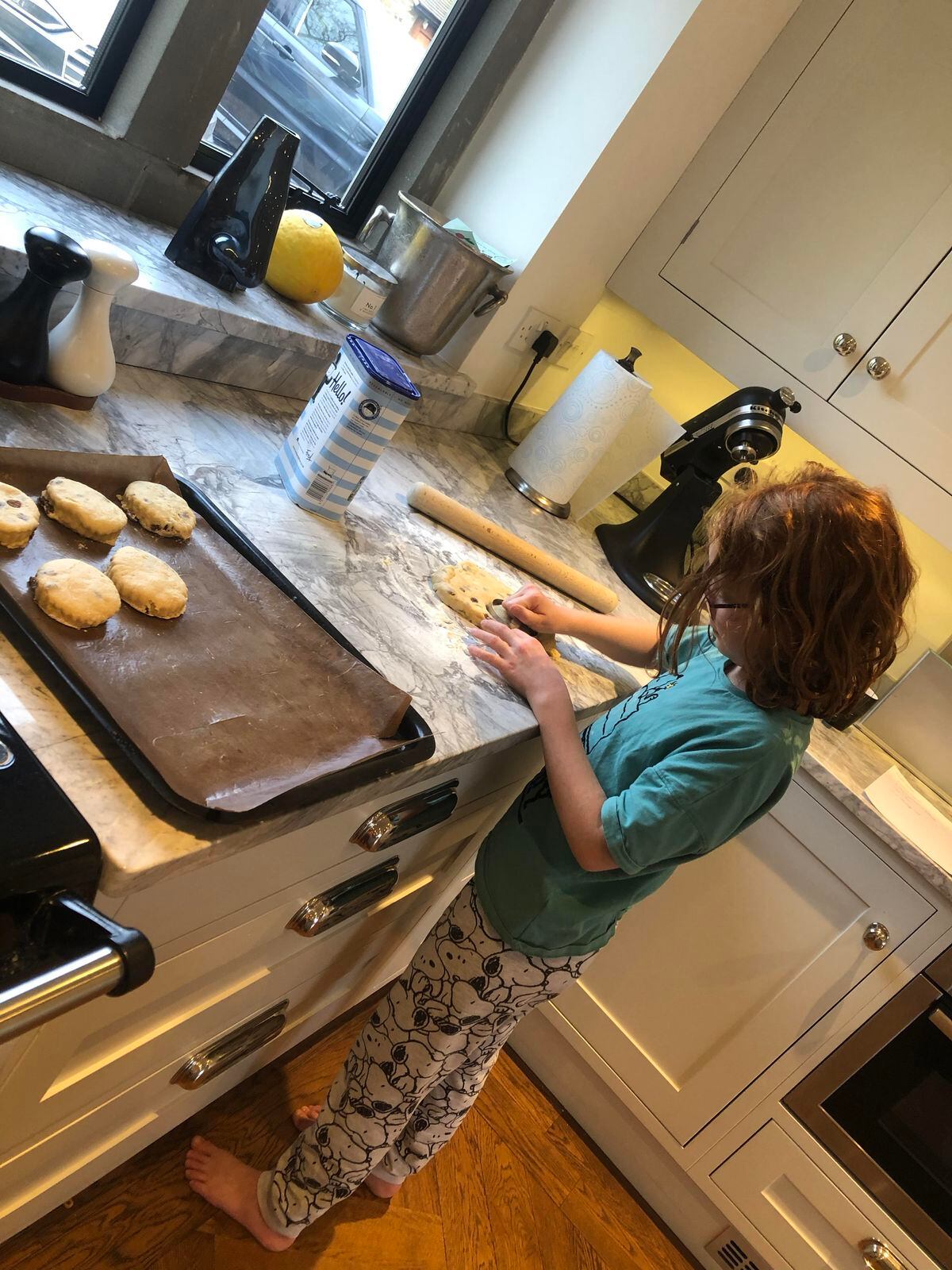 Aine Byrne, aged 9, from Bourton, Much Wenlock,  in the kitchen creating fruit scones