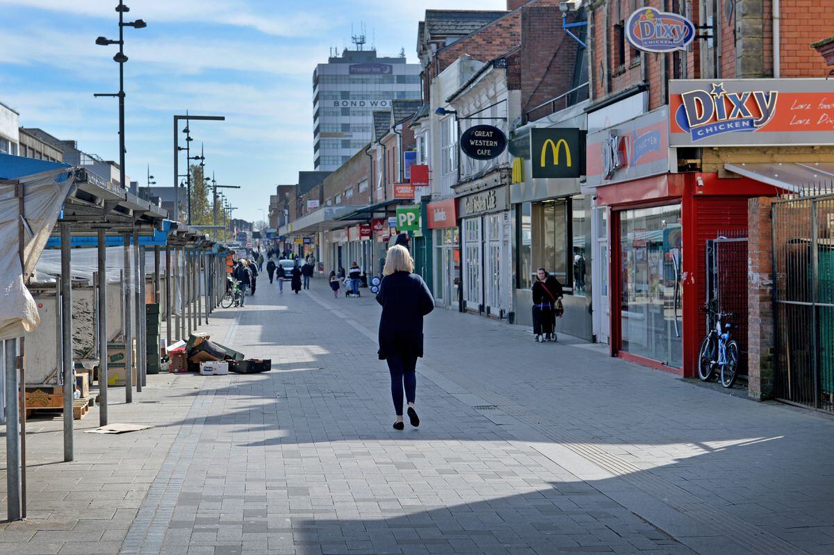 Sparse West Bromwich High Street which mirrored many towns and cities in the West Midlands today amid new strict Government advice