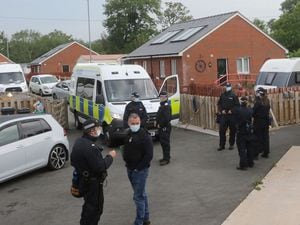 Over 30 Police vehicles at Leighton Arches caravan site Welshpool in June 2021. Picture by Phil Blagg Photography