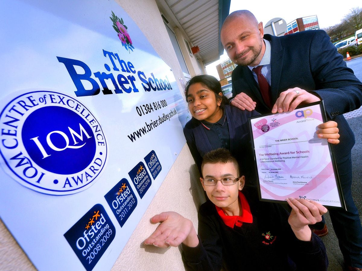 DUDLEY COPYRIGHT EXPRESS AND STAR STEVE LEATH 13/02/2020..Pic at the Brier School, Kingswinford, where they are celebrating after getting their 4th Outstanding OFSTED, a Wellbeing Award and the very top award in the Inclusion Quality Mark, where they have now become a centre of excellence and other schools will look to them to lead the way. Head: David Stanton with pupils: Maryam Ali 14 and Wesley Pearson 13..