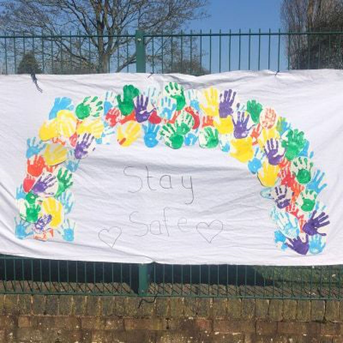 A rainbow created by pupils at Deyncourt Primary School, Wolverhampton
