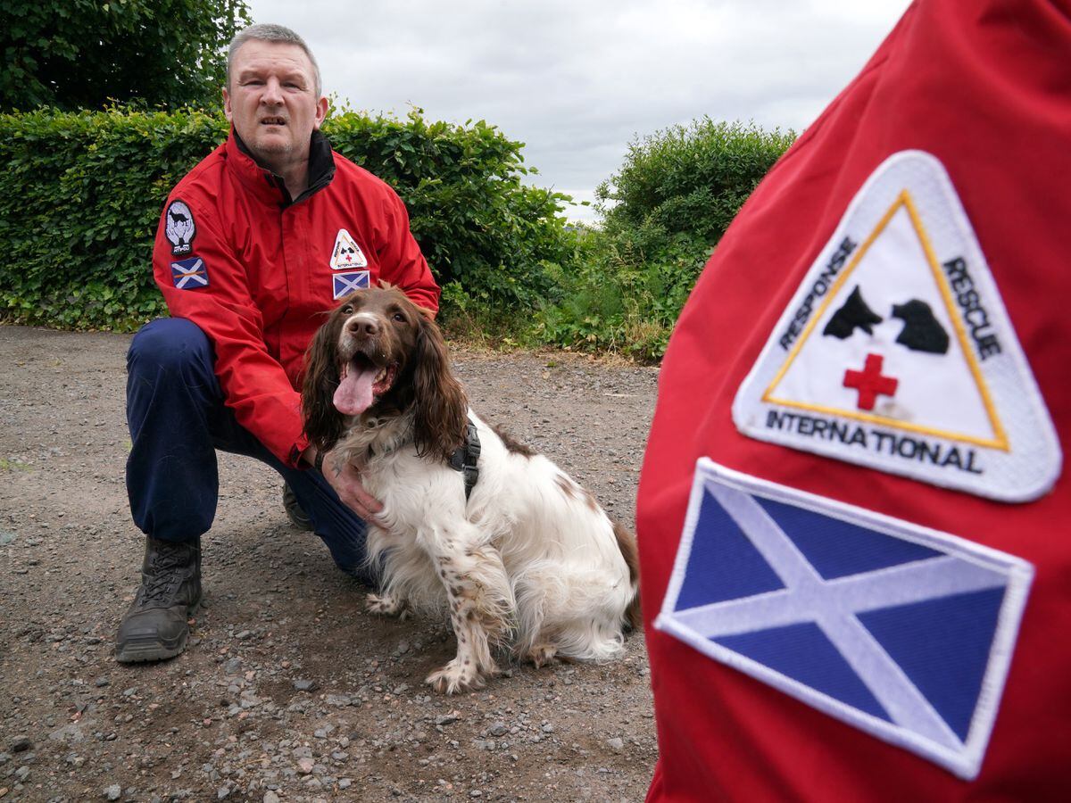 John Miskelly with his dog Bracken at his home in Falkland, Fife