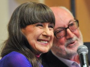 Seekers lead singer Judith Durham with fellow band member and guitarist Athol Guy at a media conference in Melbourne, Australia, in 2013