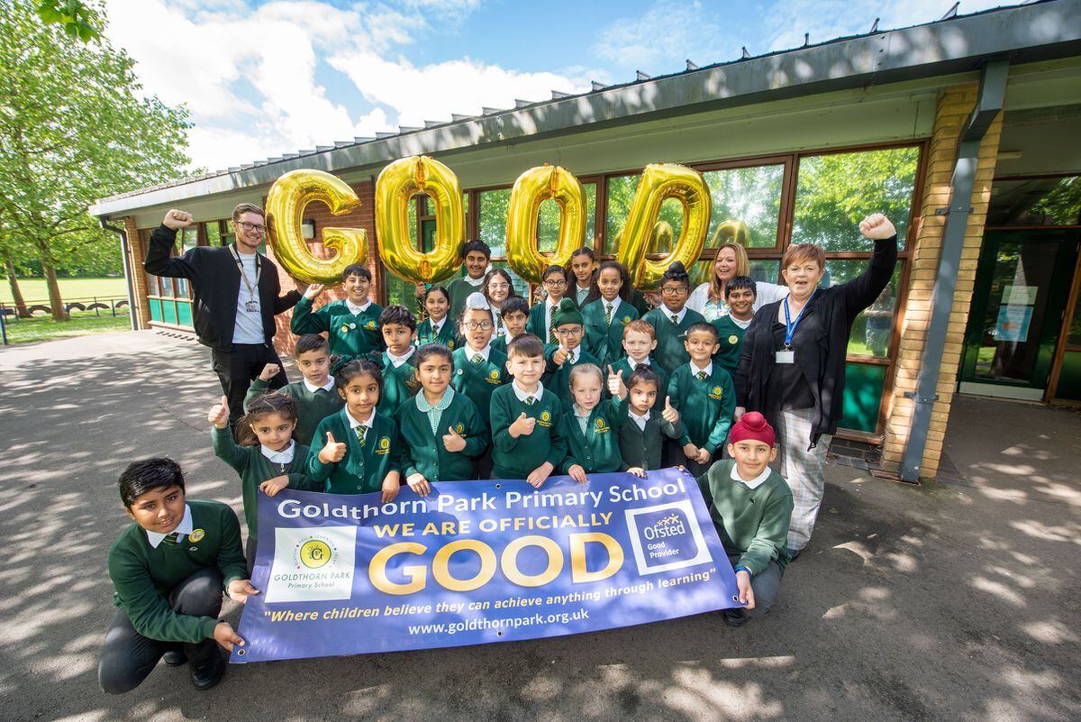 Jo Hemmings, far right, celebrates a 'good' Ofsted report with Goldthorn Park Primary School earlier this year