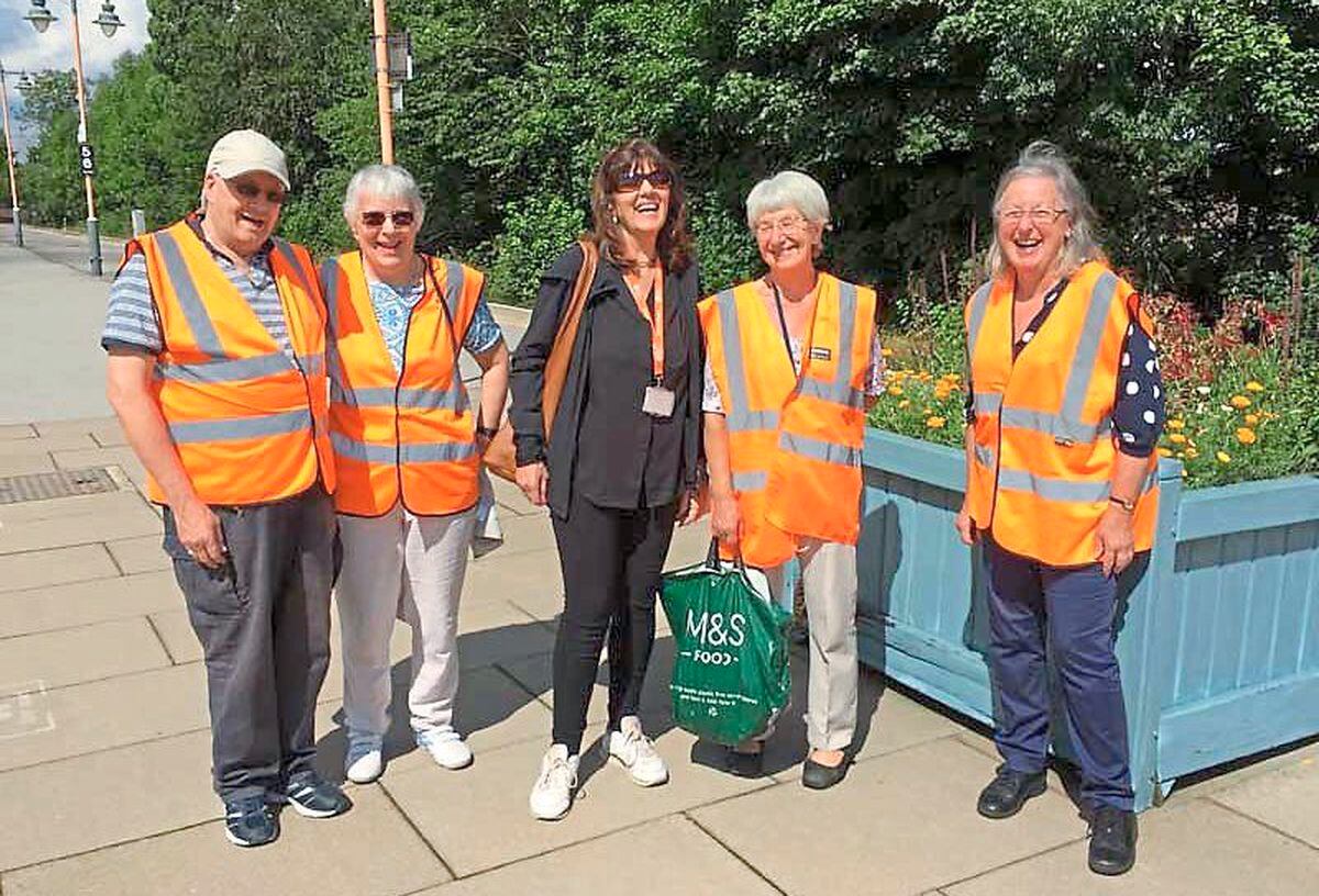 Fay Easton and station volunteers
