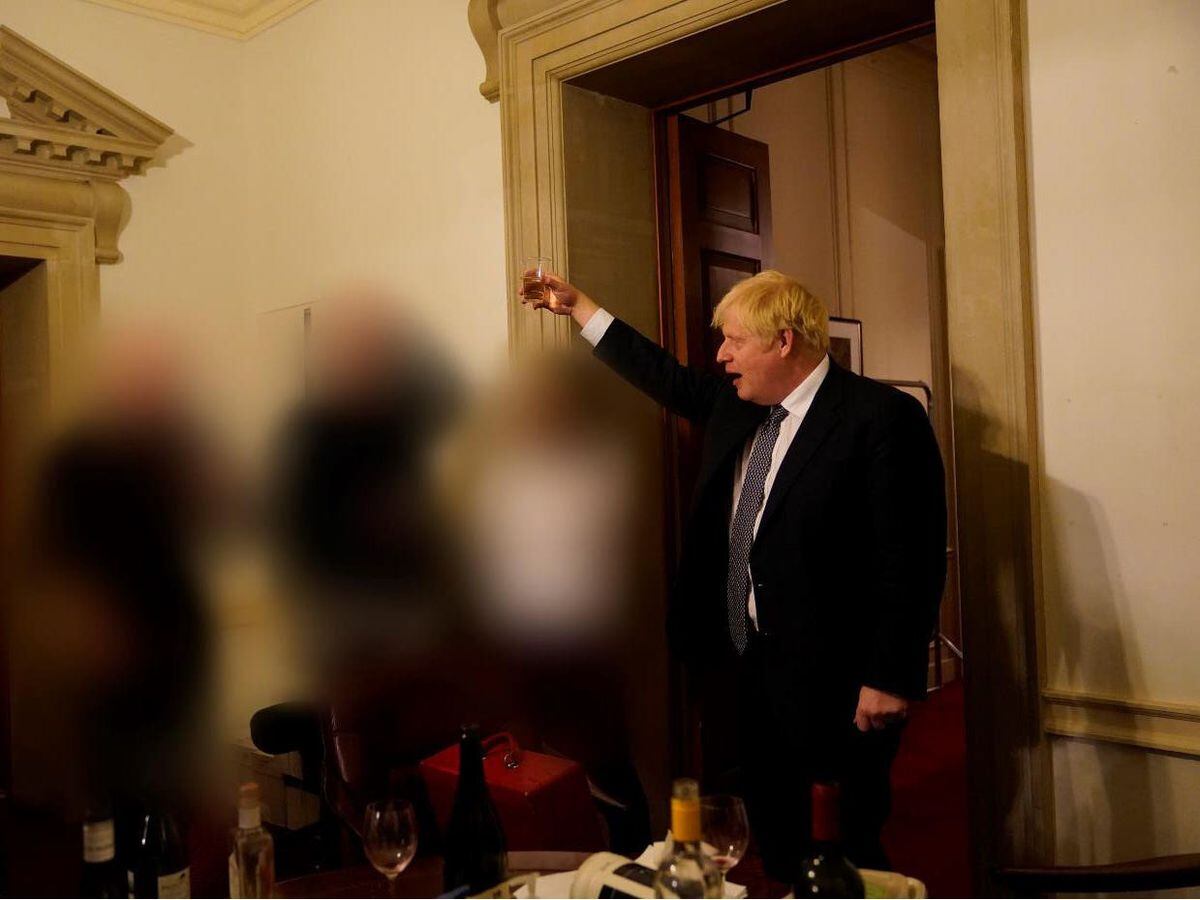 Boris Johnson at a gathering in 10 Downing Street for the departure of a special adviser, which was released with the publication of Sueâs Gray report