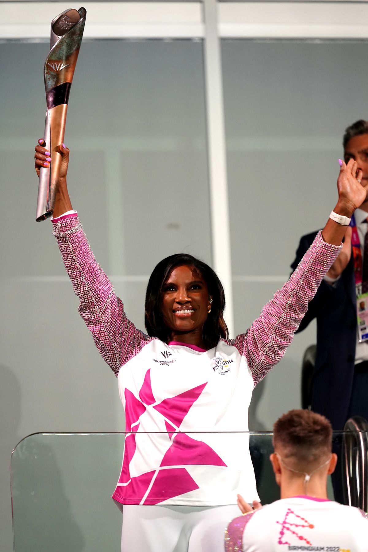 PA File Photo of Denise Lewis OBE carries the baton during the opening ceremony of the Birmingham 2022 Commonwealth Games. See PA Feature WELLBEING Denise Lewis. Picture credit should read: David Davies/PA Photos. WARNING: This picture must only be used to accompany PA Feature WELLBEING Denise Lewis