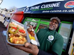 Pastor Roger Maynard has welcomed some of his congregation to his new Caribbean takeaway called Divine Cuisine